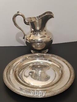 Whiting sterling water pitcher and Reed &Barton sterling platter