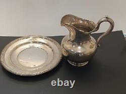 Whiting sterling water pitcher and Reed &Barton sterling platter