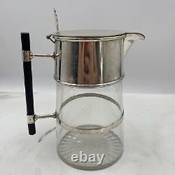 CARAFON À EAU EN ARGENT PAR CHRISTOPHER DRESSER AVEC BEC VERSEUR EN FORME CONIQUE