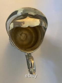 Pichet en eau vintage en argent massif orné avec pieds