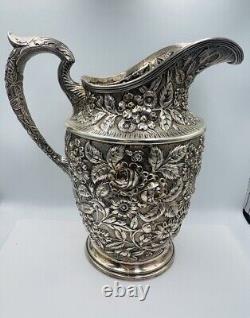 Schofield Baltimore Rose Antique Sterling Silver Floral Repousse Water Pitcher	 

 <br/><br/>
La cruche à eau en argent sterling antique Schofield Baltimore Rose en repoussé floral